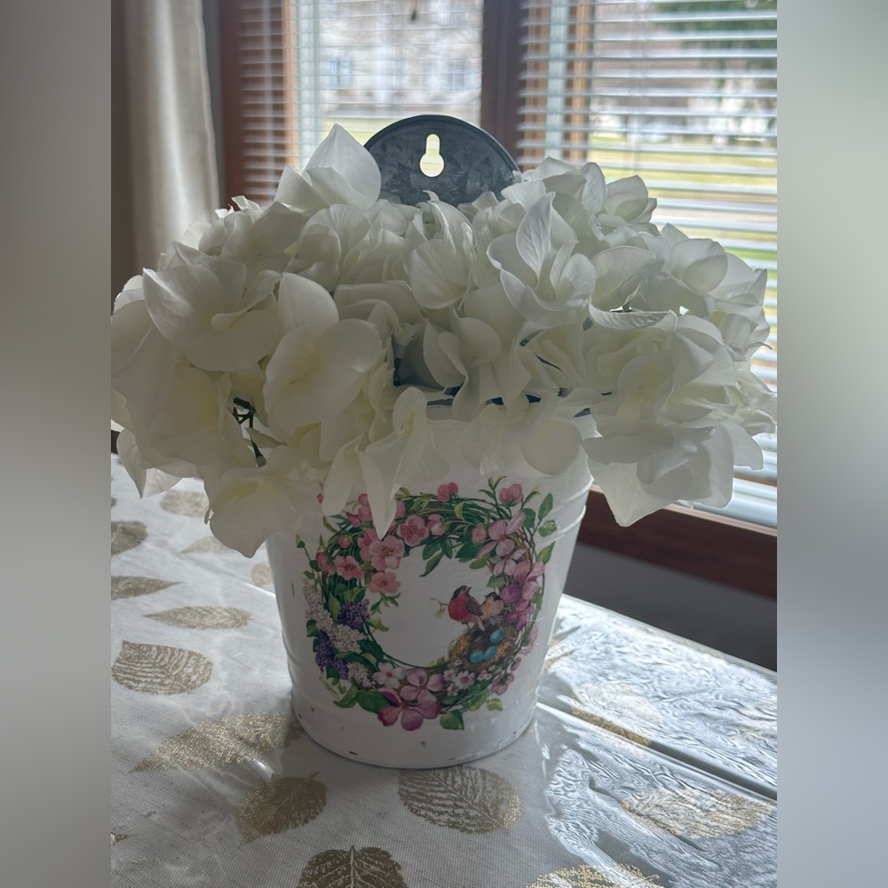 Spring decorative galvanized container with floral decoupage design